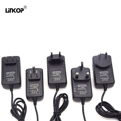 Un buen precio. Protección contra sobretensiones 12v 2a fuente de alimentación LED con enchufe intercambiable US/Eu/UK/Au/Cn en línea
